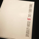 At the Card Table by Darwin Ortiz