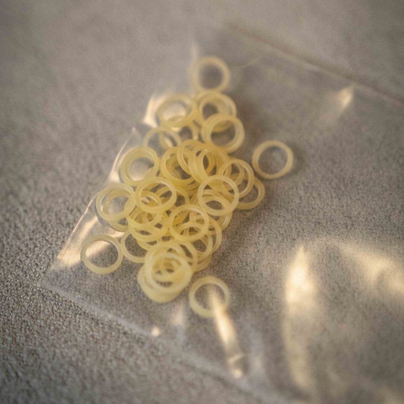 Spare Rubber Bands for Flipper coins & Folding coins - (15 per package) - Brown Bear Magic Shop